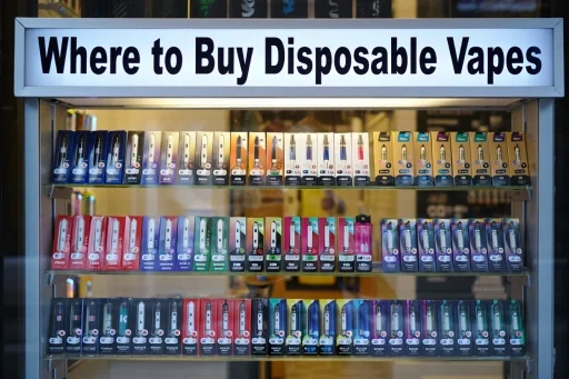 alibarbar chupa chups​ - alibarbar chupa chups device angled on Australian timber desk showing pastel shell and QR code